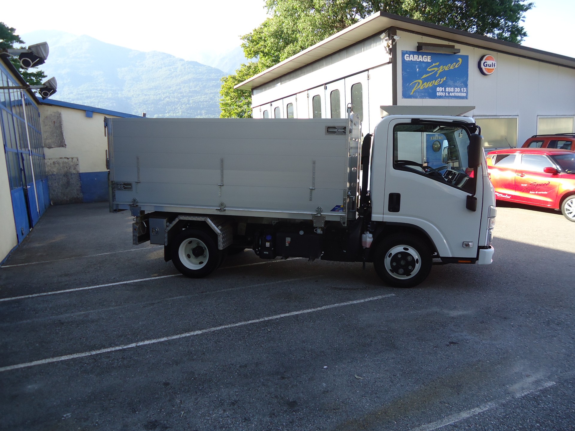 ISUZU M27 - Ponte Ribaltabile 3 Lati in Alluminio con Sopra Sponde + Gancio Traino KG. 3500-image-3