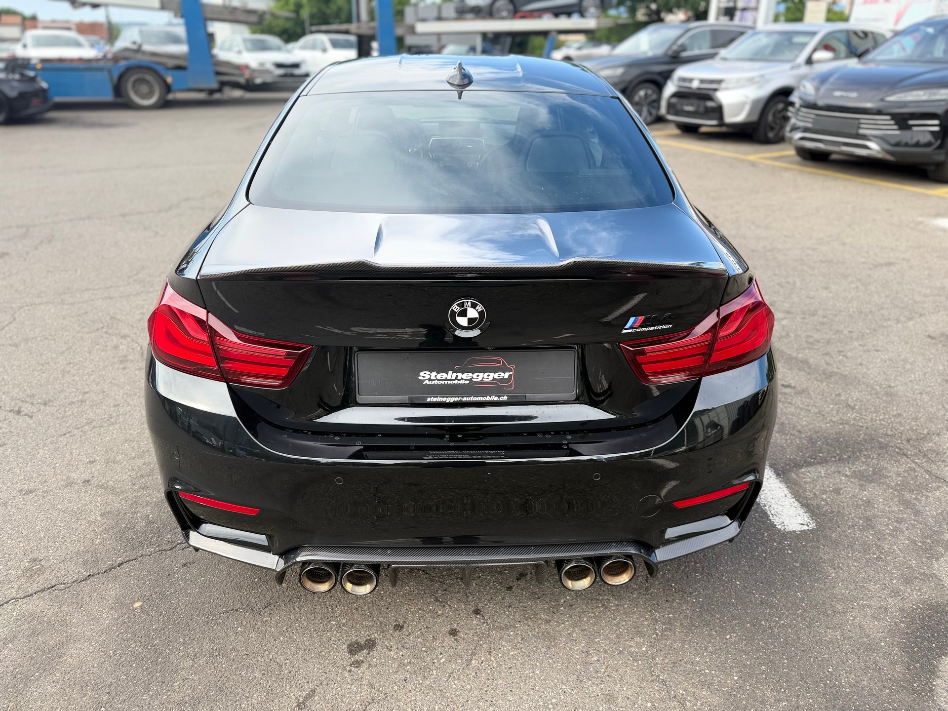 BMW M4 Coupé Competition DKG ° All Black + Carbon °-image-8