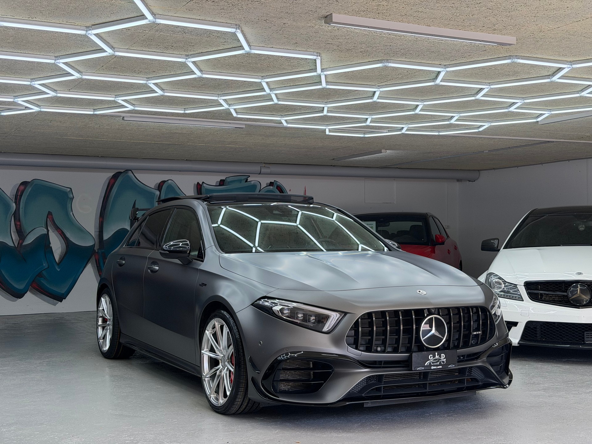 MERCEDES-BENZ A 45 S AMG 4Matic+ Speedshift *19 Silver wheels / aero kit / Designo Magno grey / CH Auto*-image-1