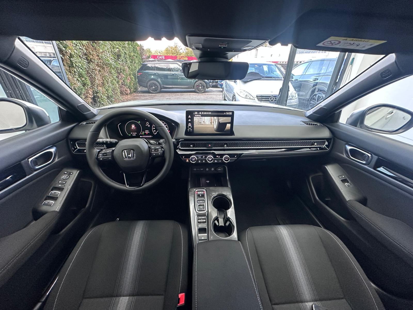 HONDA Civic 2.0 i-MMD HEV | Elegance Tageszulassung | CH-Fahrzeug | 8 Jahre Werksgarantie |-image-13