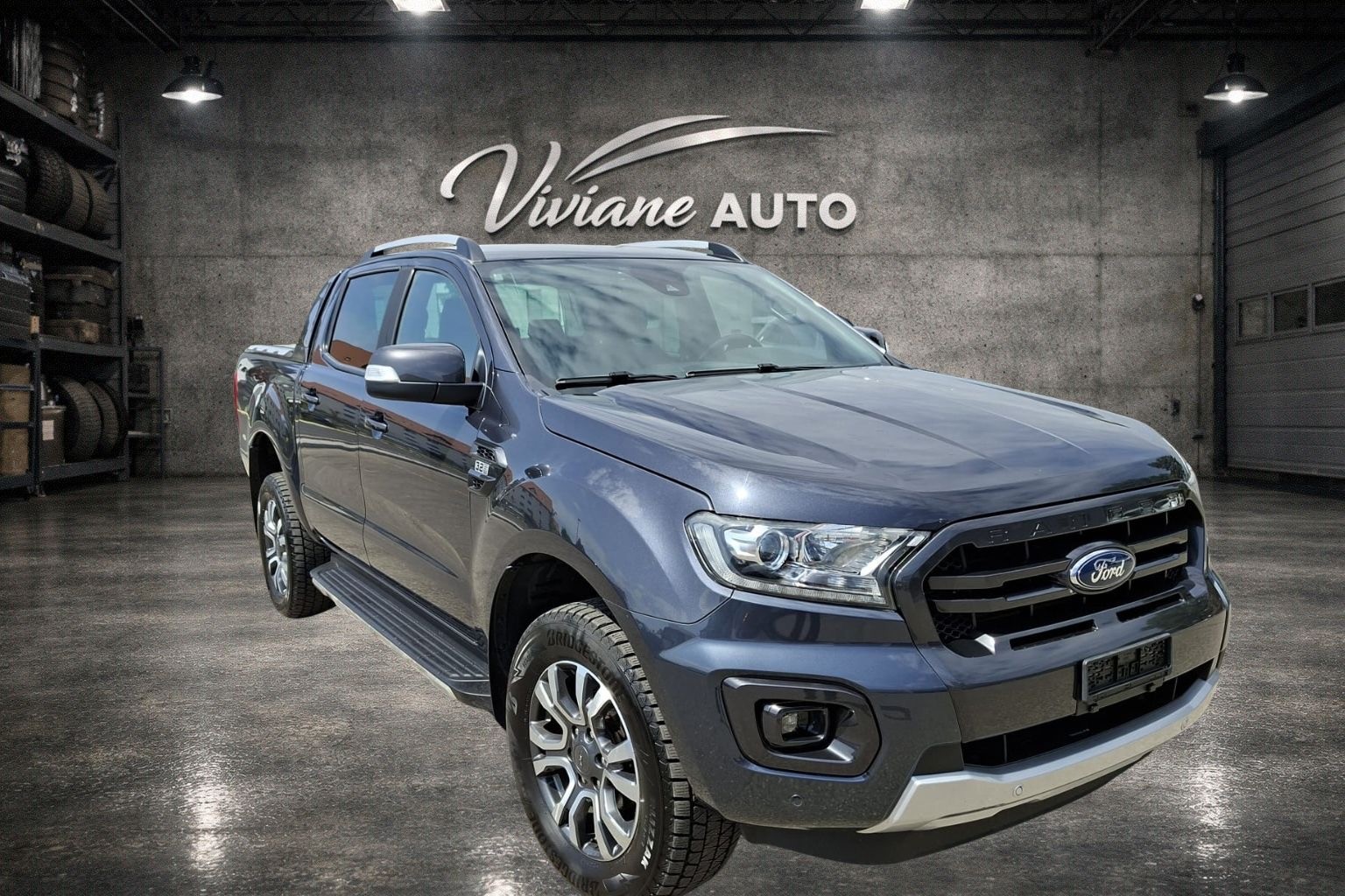 FORD Ranger Wildtrak 3.2 TDCi 4x4 A couvre-benne aluminium roulant rigide.