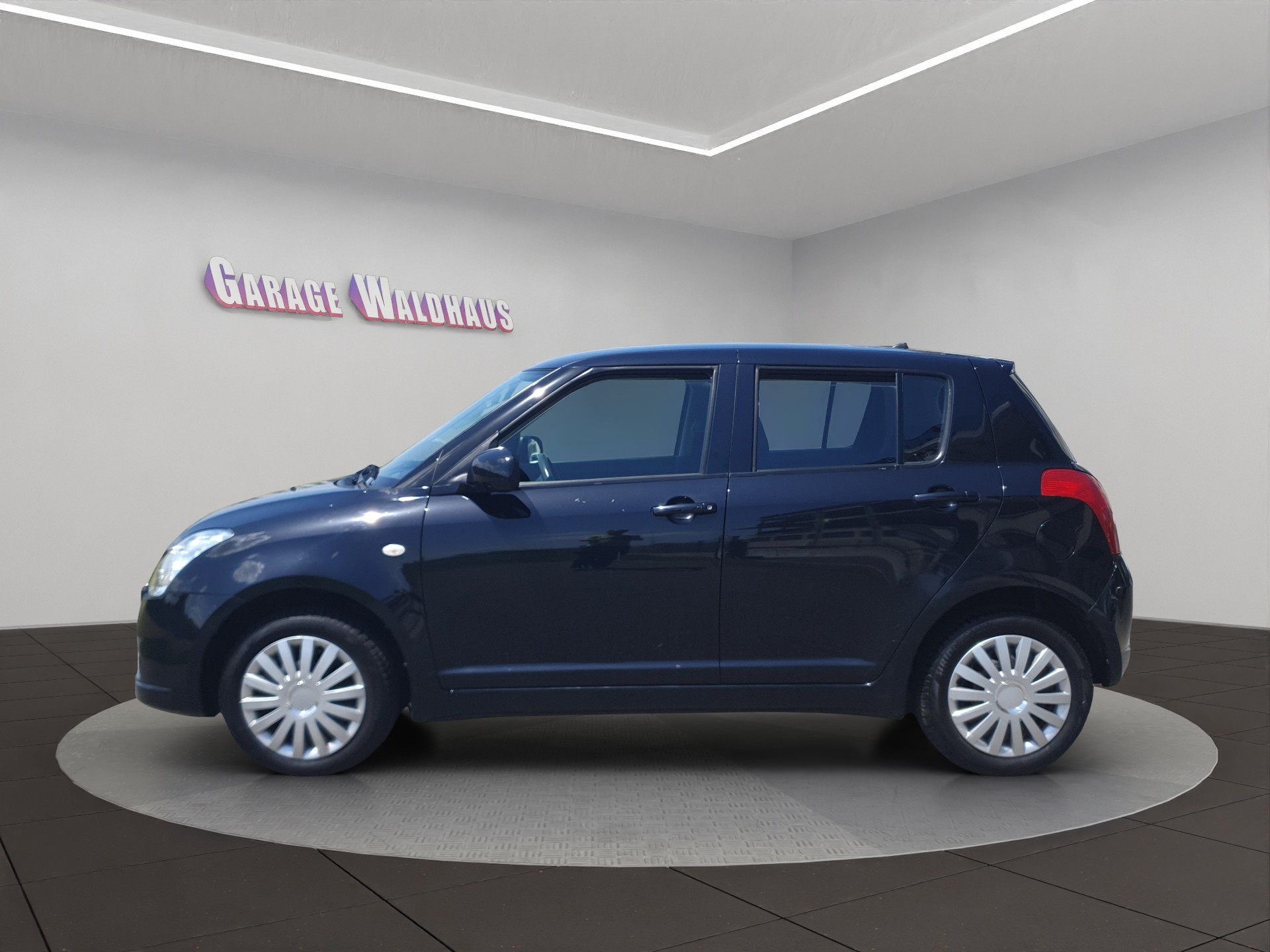 SUZUKI Swift 1.3i 16V GL Top 4x4-image-1
