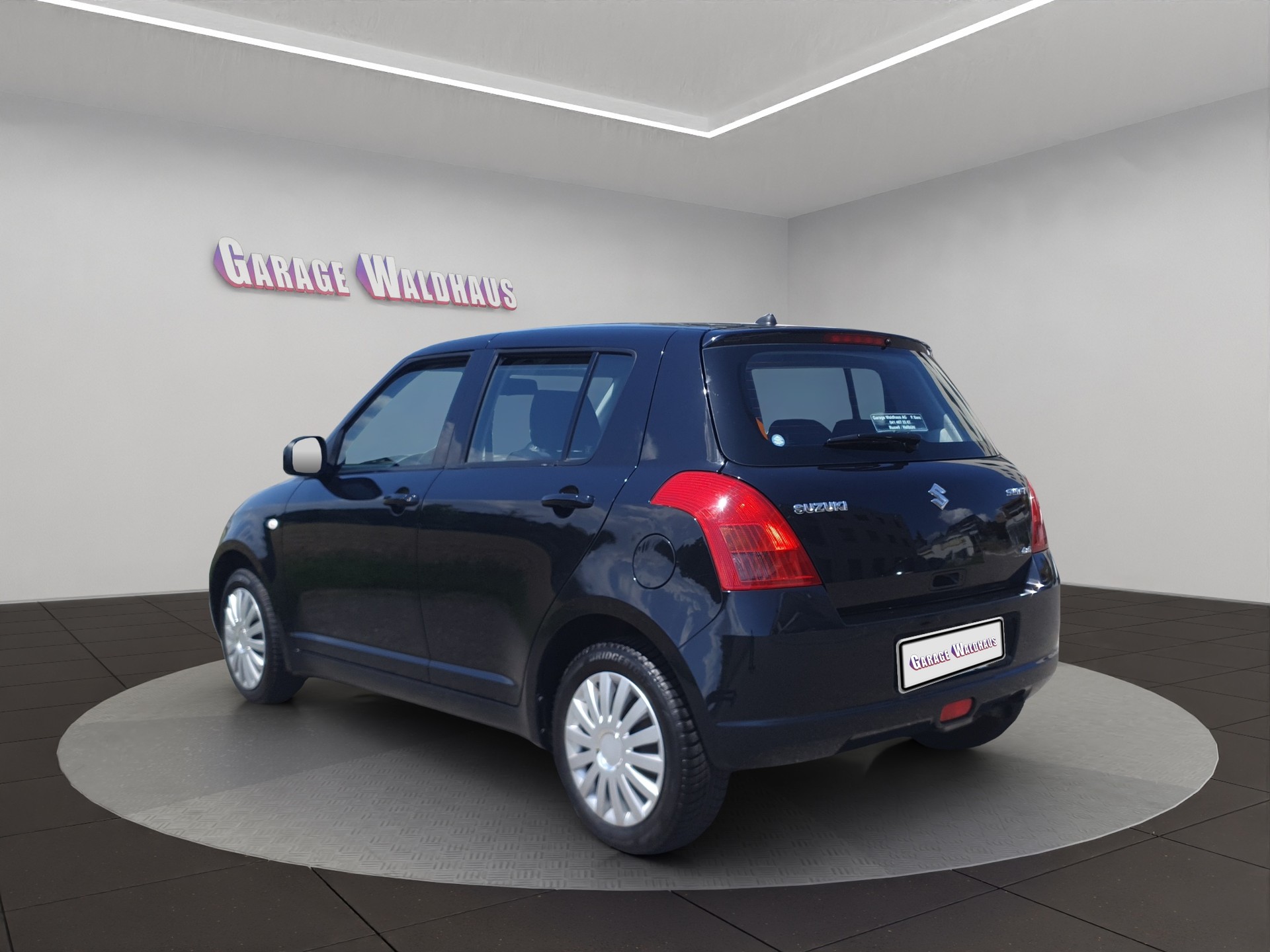 SUZUKI Swift 1.3i 16V GL Top 4x4-image-2
