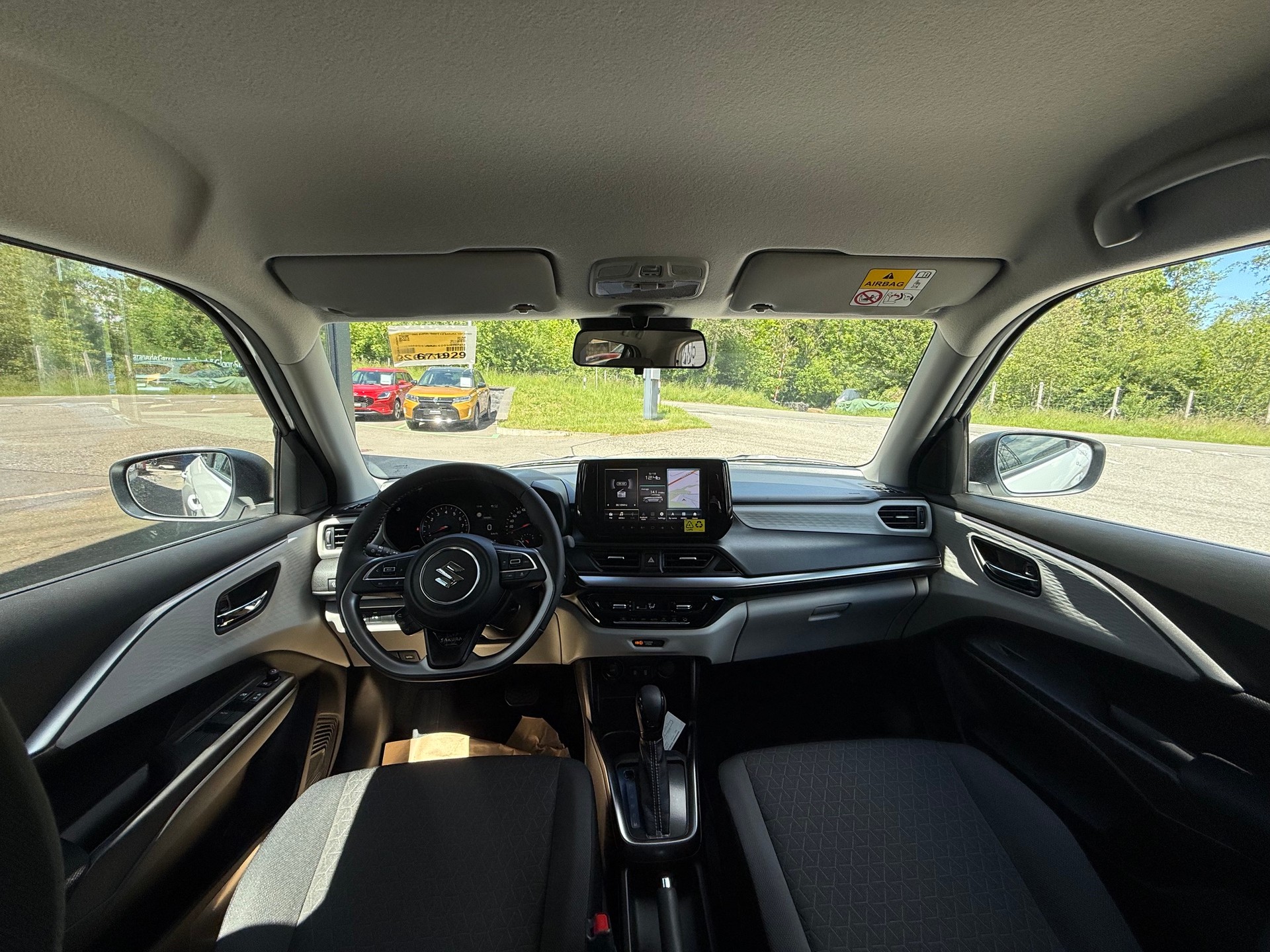 SUZUKI Swift 1.2 Sakura Top Hybrid CVT-image-10