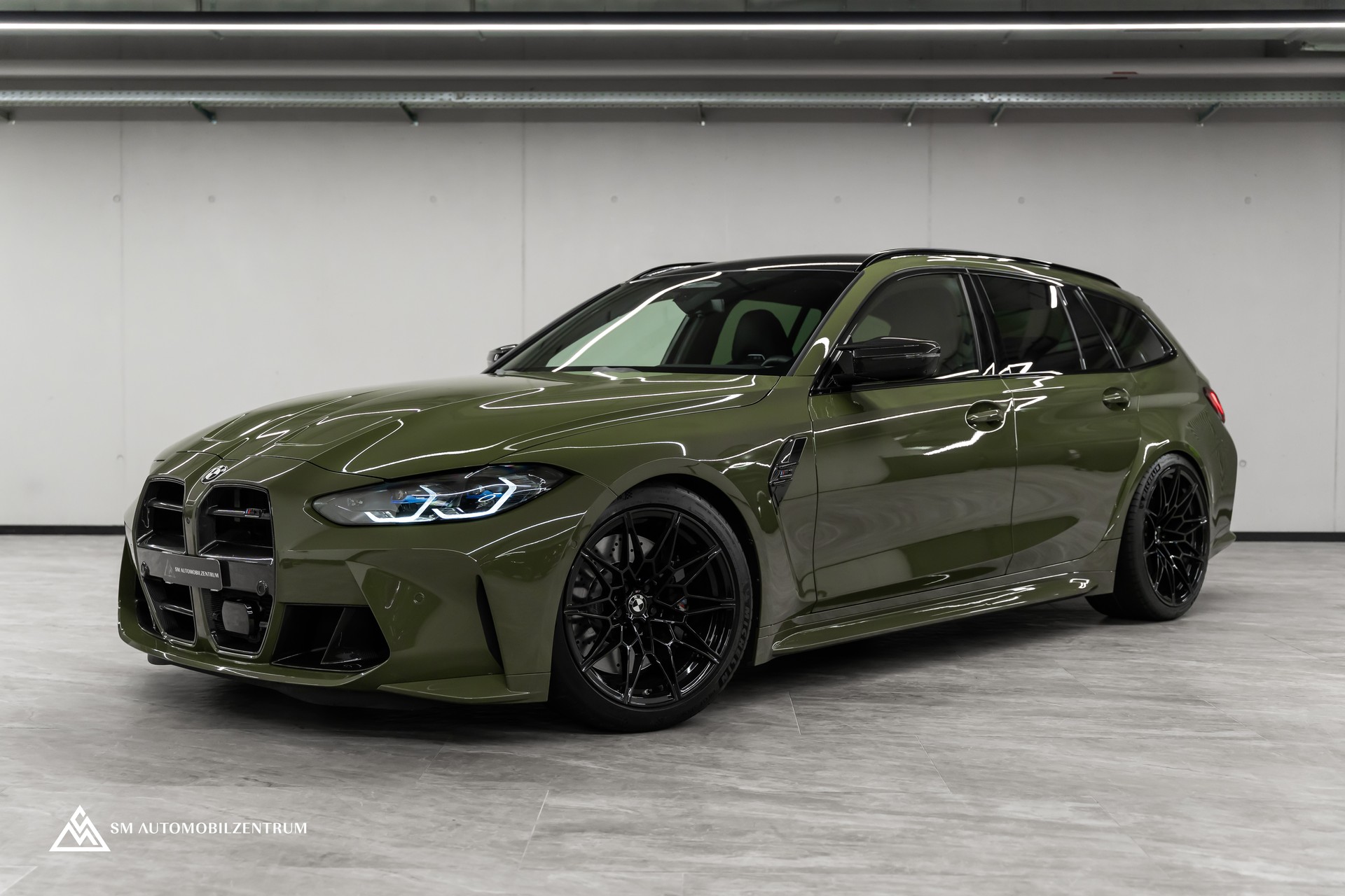 BMW M3 Competition xDrive Touring / Urban Green II / Carbon Exterieur & Interieur / Werksgarantie / 360°