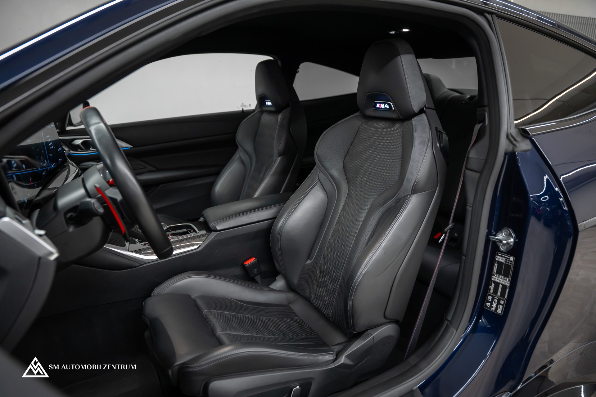 BMW M4 Competition xDrive Coupé / CH / Werksgarantie / Carbon Exterieur & Interieur / Tansanitblau / 360°-image-23