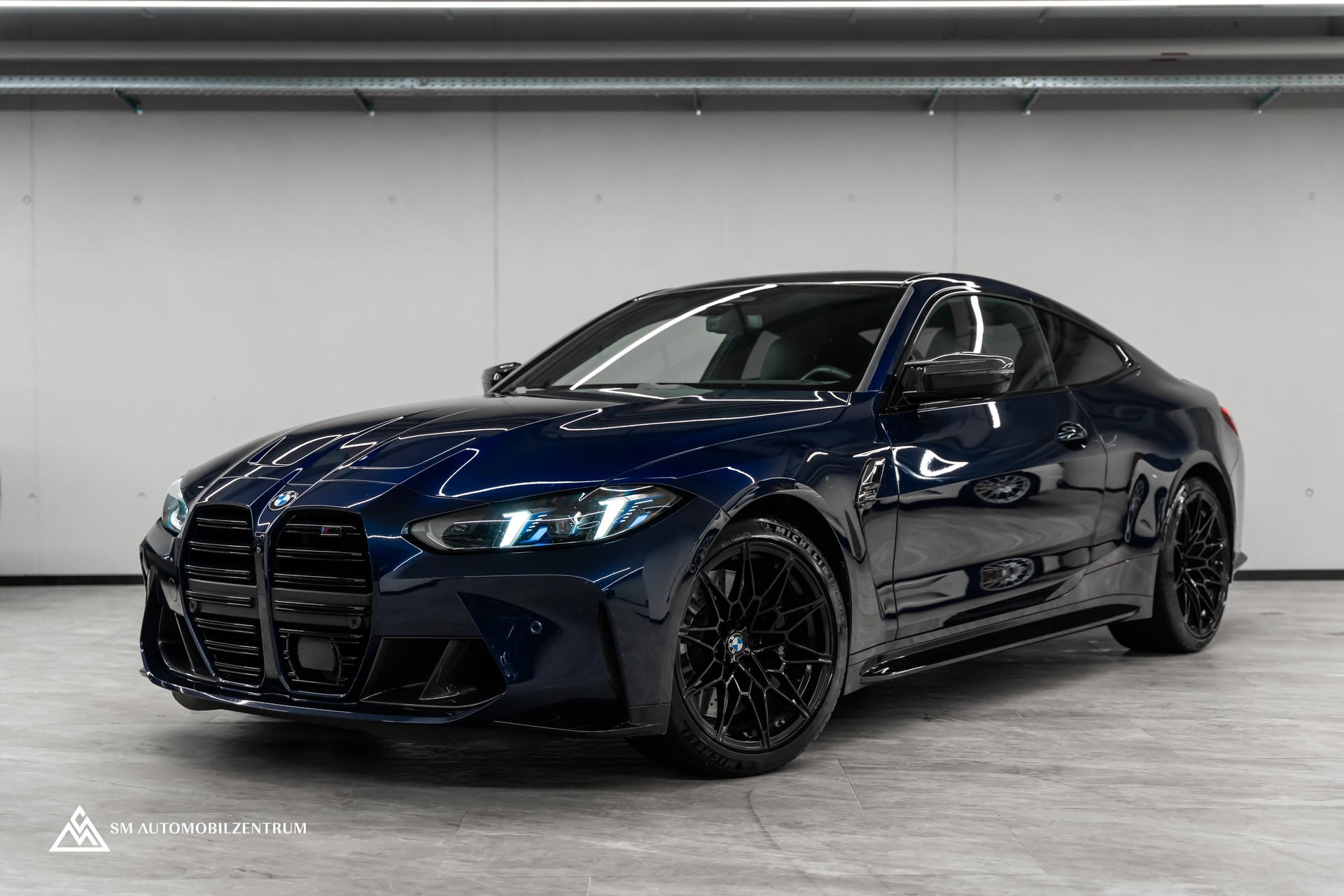 BMW M4 Competition xDrive Coupé / CH / Werksgarantie / Carbon Exterieur & Interieur / Tansanitblau / 360°