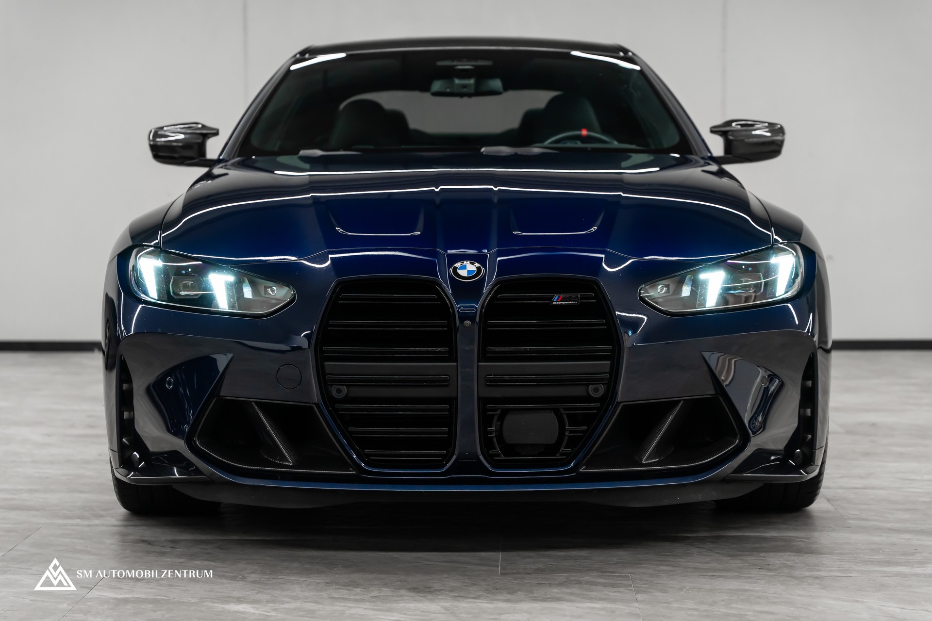 BMW M4 Competition xDrive Coupé / CH / Werksgarantie / Carbon Exterieur & Interieur / Tansanitblau / 360°-showroom-element-1