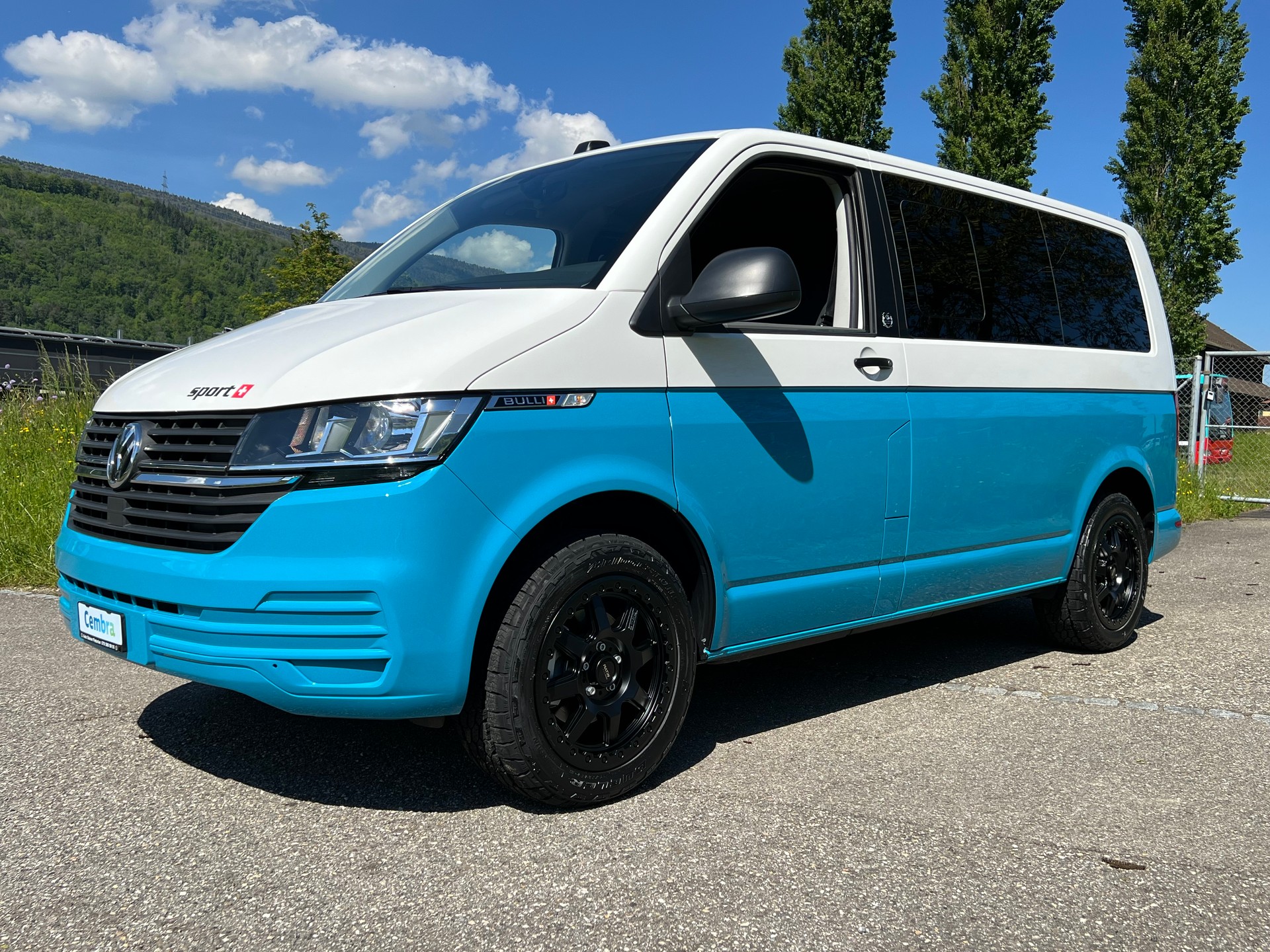 VW VW T6.1 "BULLI BUS" BI COLOR .AUTOMAT. 9 PLÄTZER. 18" ALU NEU. CH WAGEN. TOP GEPFLEGT. MIT GARANTIE. LEASING 450.-