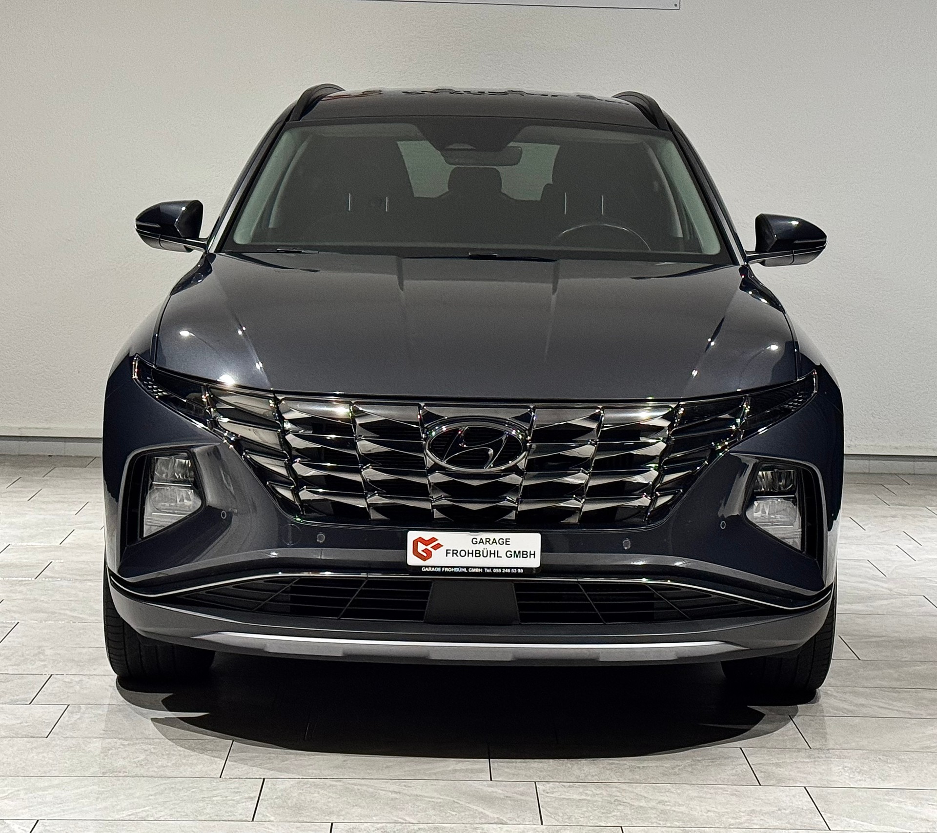 HYUNDAI Tucson 1.6 TGDI HEV Amplia 4WD | 1.Hand | CH |-showroom-element-1