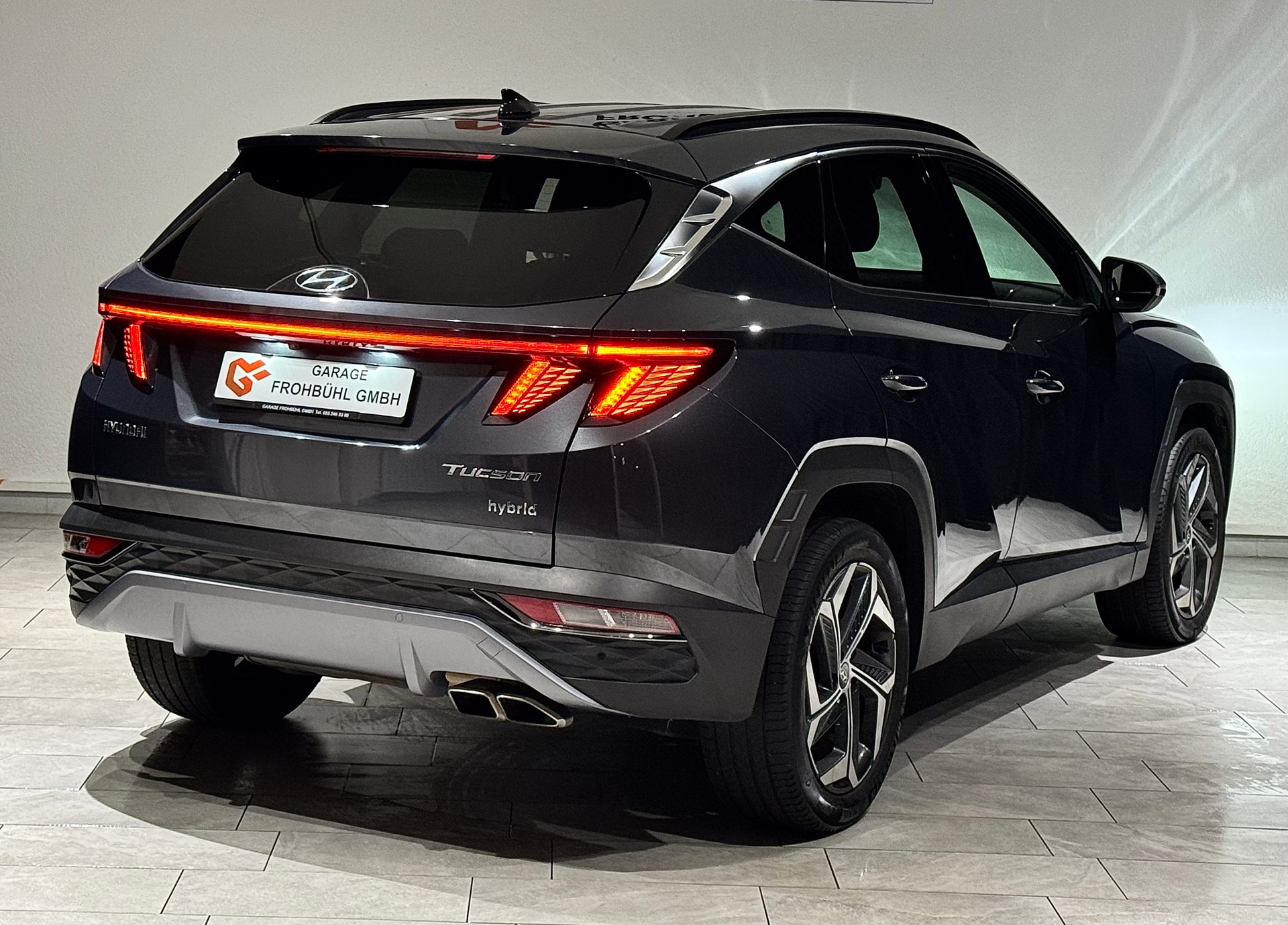 HYUNDAI Tucson 1.6 TGDI HEV Amplia 4WD | 1.Hand | CH |-showroom-element-3
