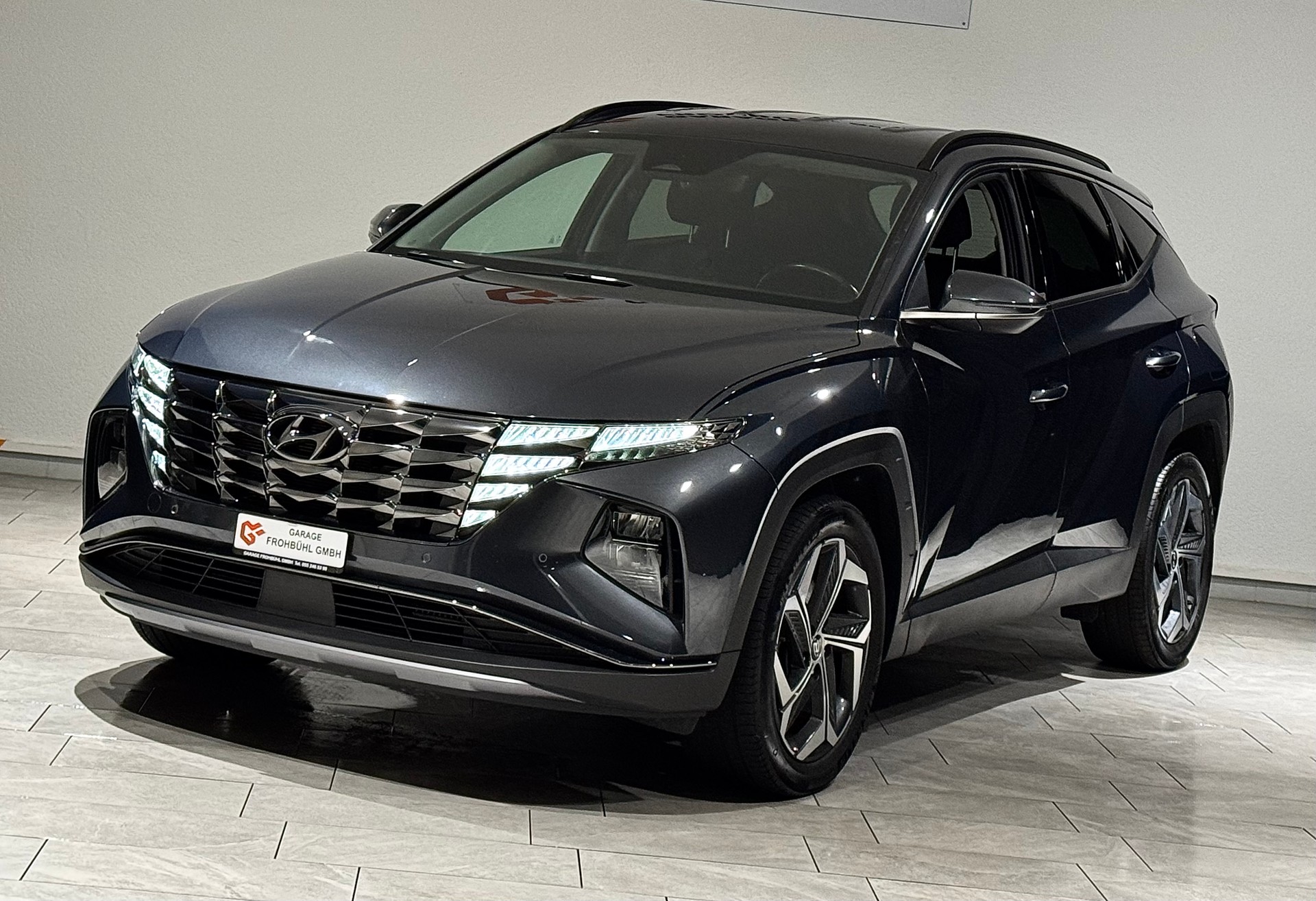 HYUNDAI Tucson 1.6 TGDI HEV Amplia 4WD | 1.Hand | CH |