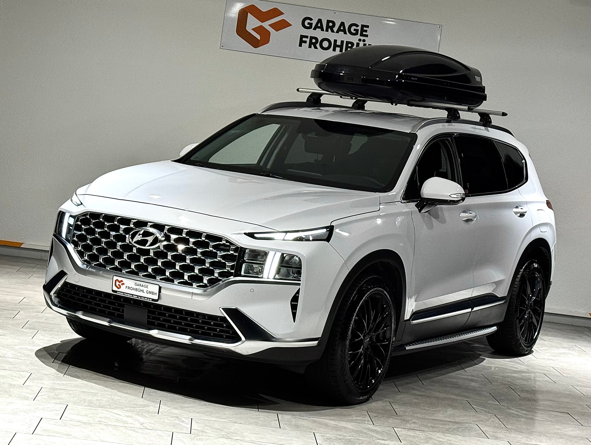 HYUNDAI Santa Fe 1.6 T-GDi HEV Amplia 4WD Automatic | 1.Hand | Inkl. Dachbox | Werksgarantie |