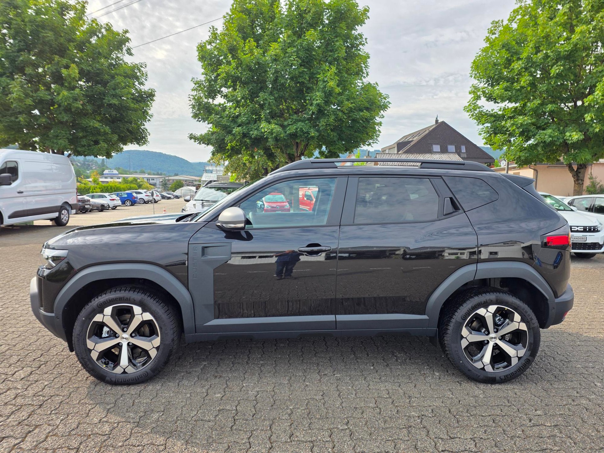 DACIA Duster 1.2 Hybrid Journey 4WD-image-1