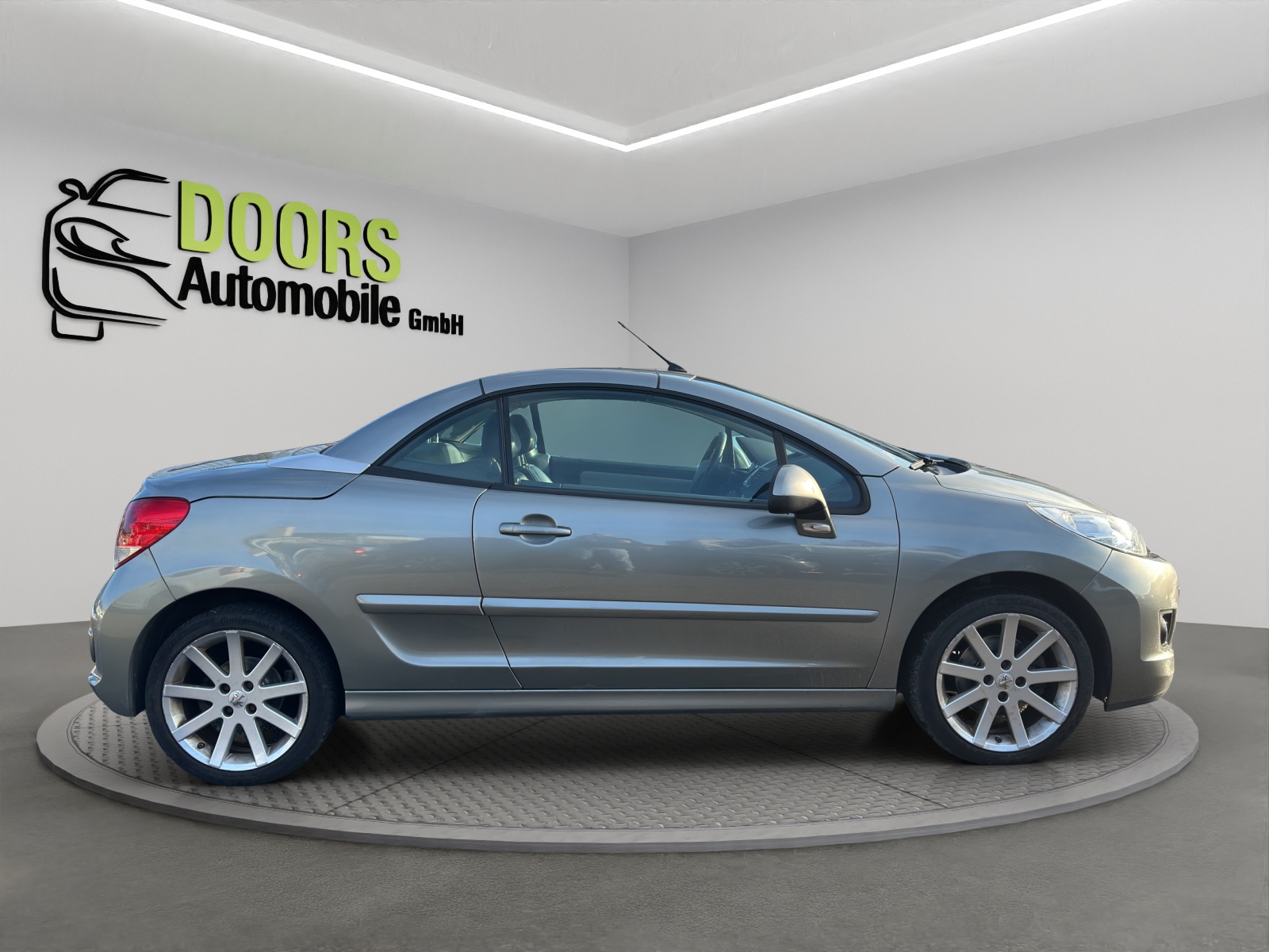PEUGEOT 207 CC 1.6 16V Turbo Roland Garros Edition-image-7