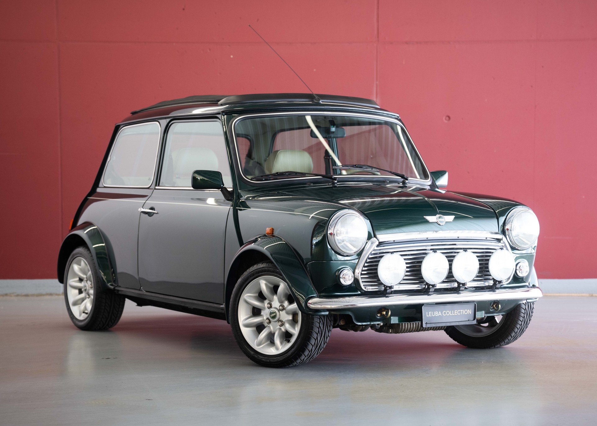 MINI 1.3i Knightsbridge (1st hand Swiss car, as new, certified very low mileage, sunroof, collector item)