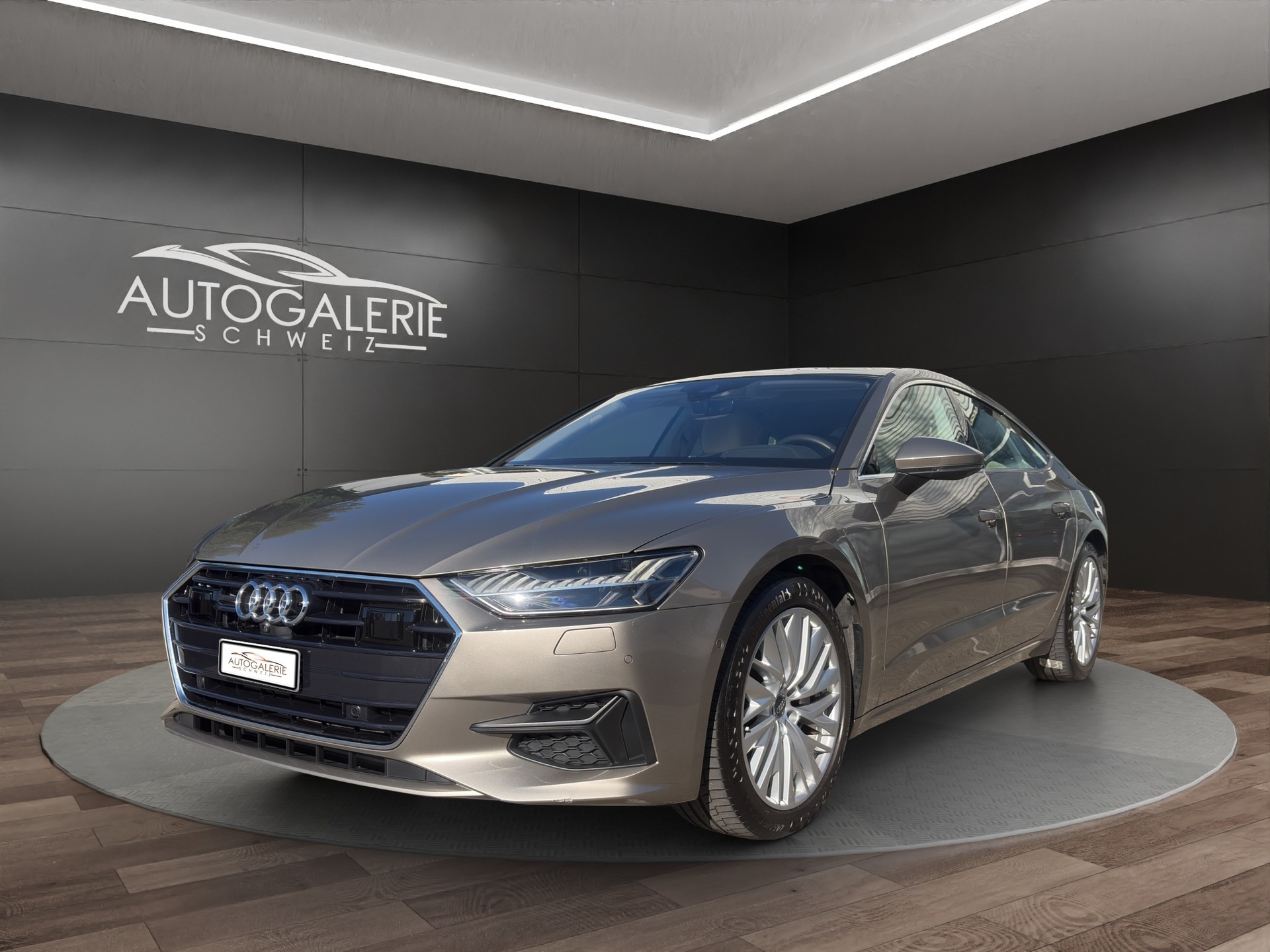 AUDI A7 Sportback 55 TFSI quattro | CH | ERSTBESITZ | Leder Valcona Beige | Nachtsicht | AHK | HeadUp | Luftfederung |